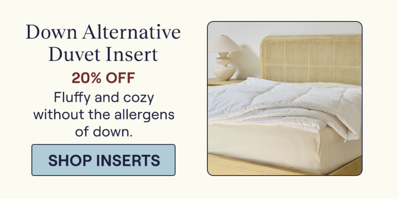 The Down Alternative Duvet Insert laying on a bed