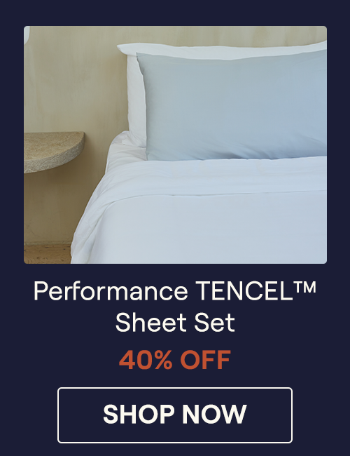 A white Performance TENCEL Sheet Set on a bed