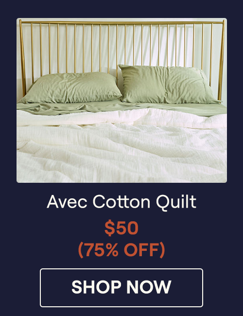 A Pearl Cotton Comforter on a bed with Sage Sheets
