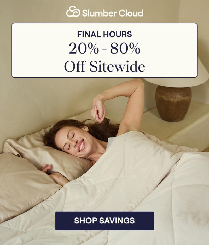 A woman laying in bed with the UltraCool Comforter