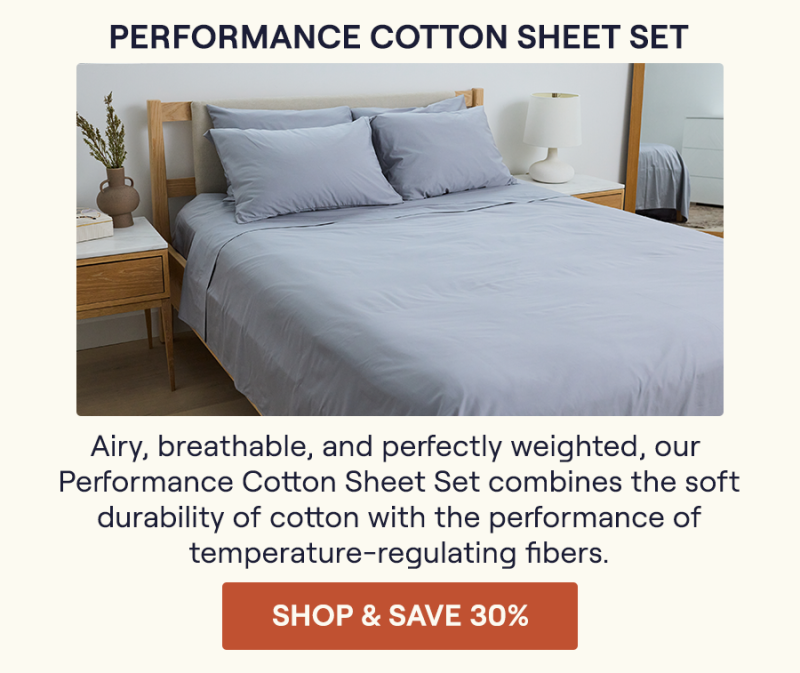 The Pewter Performance Cotton Sheet Set on a bed