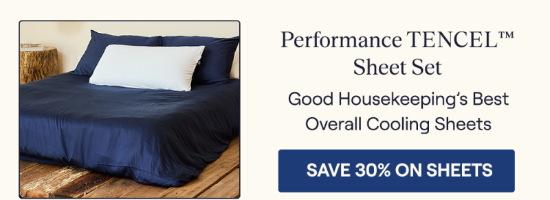 The Navy Performance TENCEL™&nbsp;Sheet Set on a bed