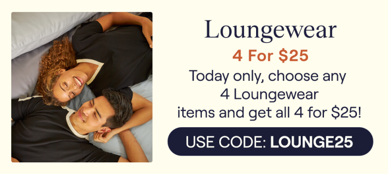 A couple laying in bed wearing the UltraCool Loungewear