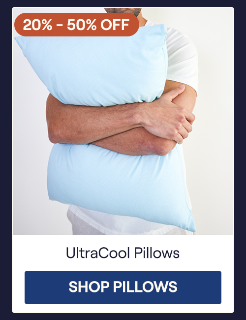 A man hugging an UltraCool Pillow