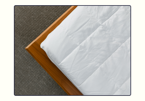 Overhead view of the corner of the Core Mattress Pad