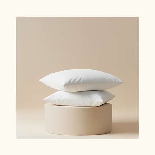 Two Performance Cotton Pillow Covers stacked on each other sitting on a pillar