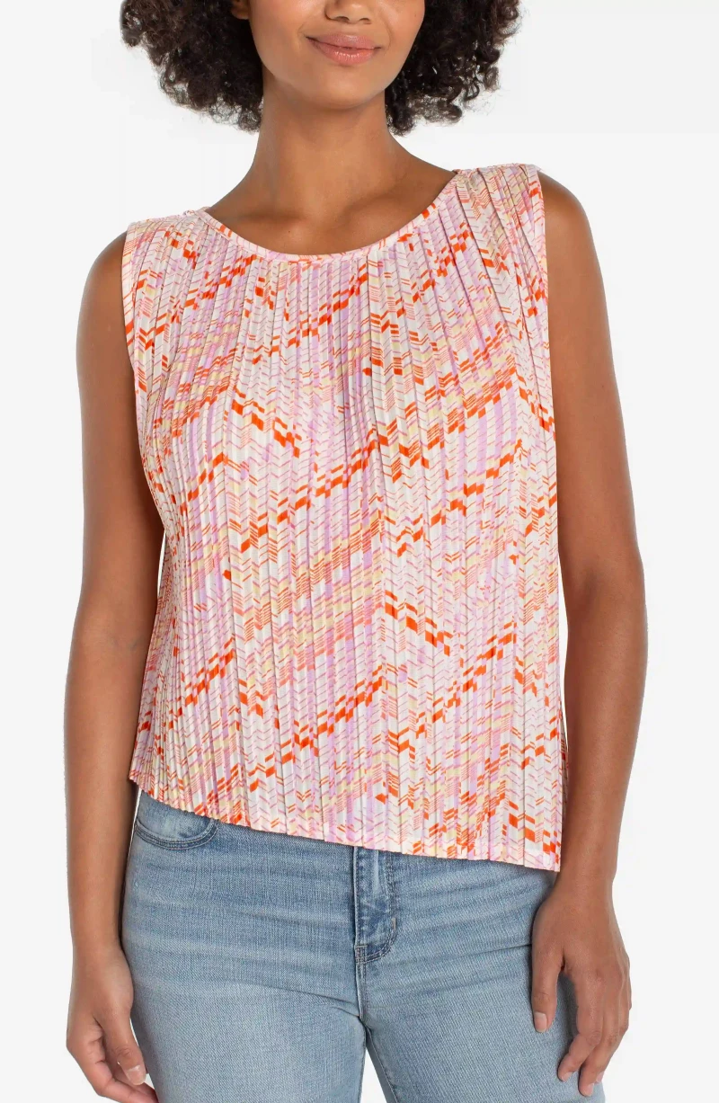 Image of sleeveless crew neck asym hem knit top