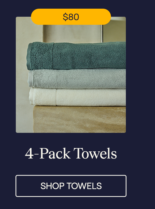The Eucalyptus, Gray, and Ivory Performance Plush Towels in a stack
