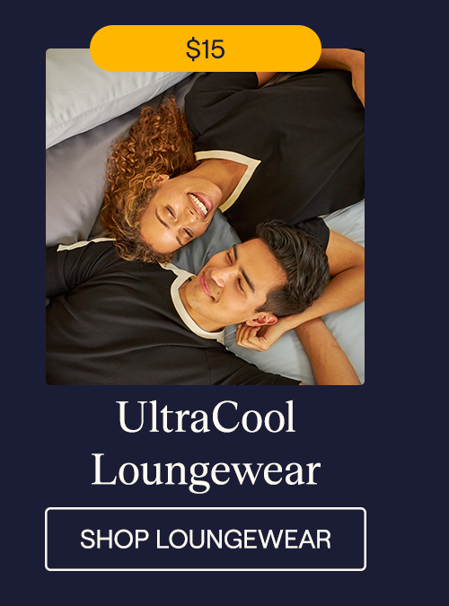 A man and woman laying in bed wearing UltraCool Loungewear