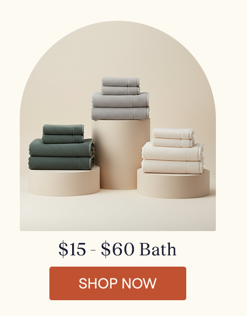 The Performance Plush Towels sitting on pillars.