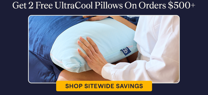 A woman putting a pillowcase on the UltraCool Pillow
