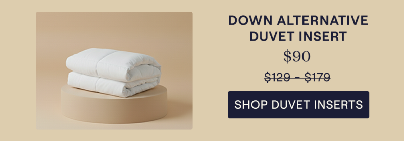 The Down Alternative Duvet Insert sitting on a pillar