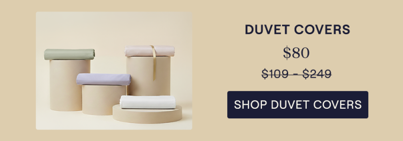 The Performance Cotton Duvet Covers sitting on pillars