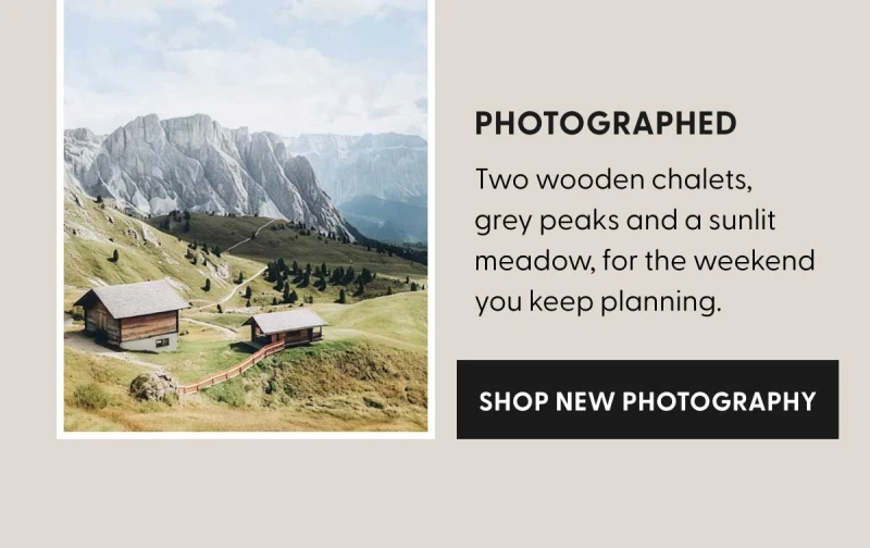 Photographed | Two wooden chalets, grey peaks and a sunlit meadow, for the weekend you keep planning. | SHOP NEW PHOTOGRAPHY
