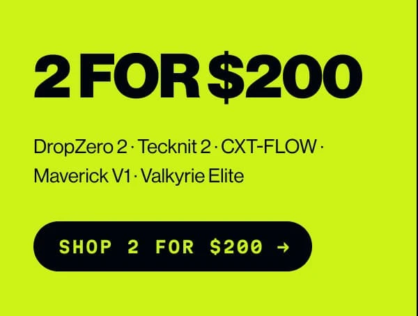 A woman in a blue and green TYR tech suit, on sale up to 60% off.