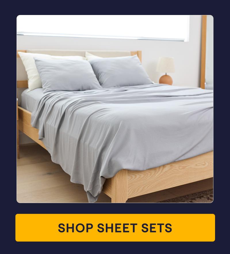 The Storm Performance Linen Bed Sheets on a bed