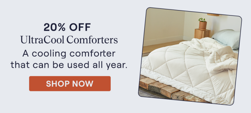The Sand UltraCool Comforter on a bed