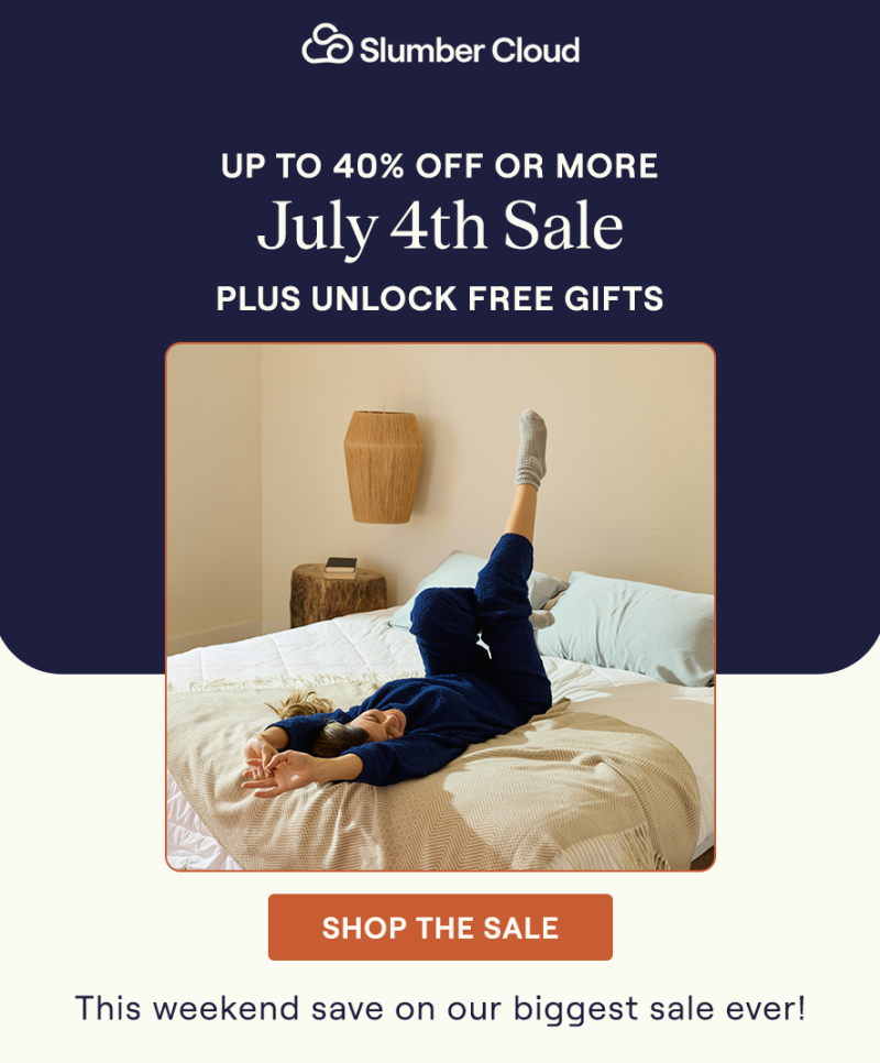 A woman laying on a bed with the UltraCool Comforter, and Woven Throw