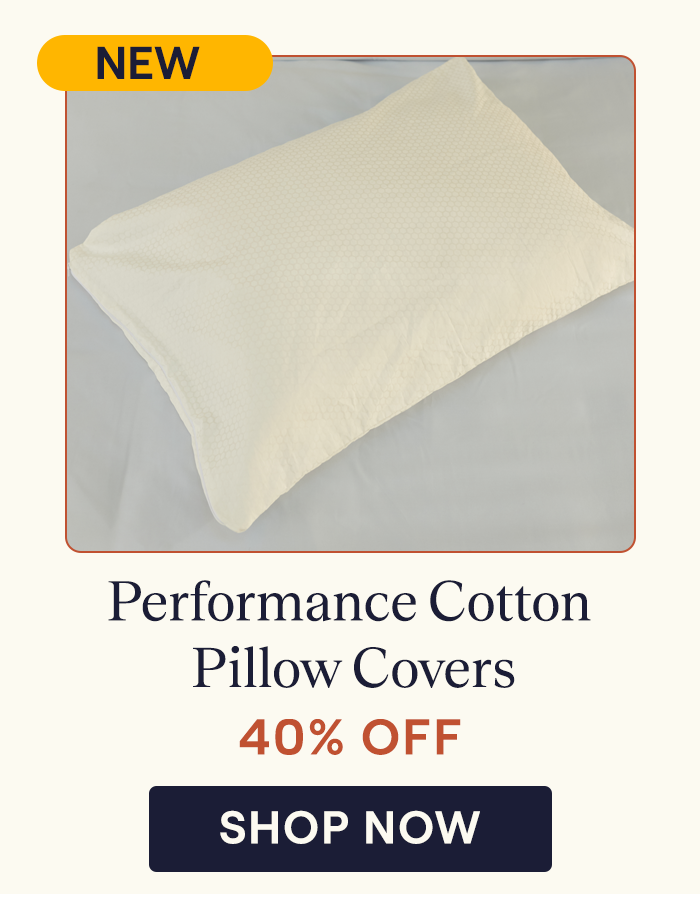 A pillow with the Performance Cotton Pillow Cover on top of it