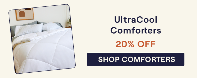 A white UltraCool Comforter on a bed